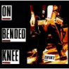 ON BENDED KNEE